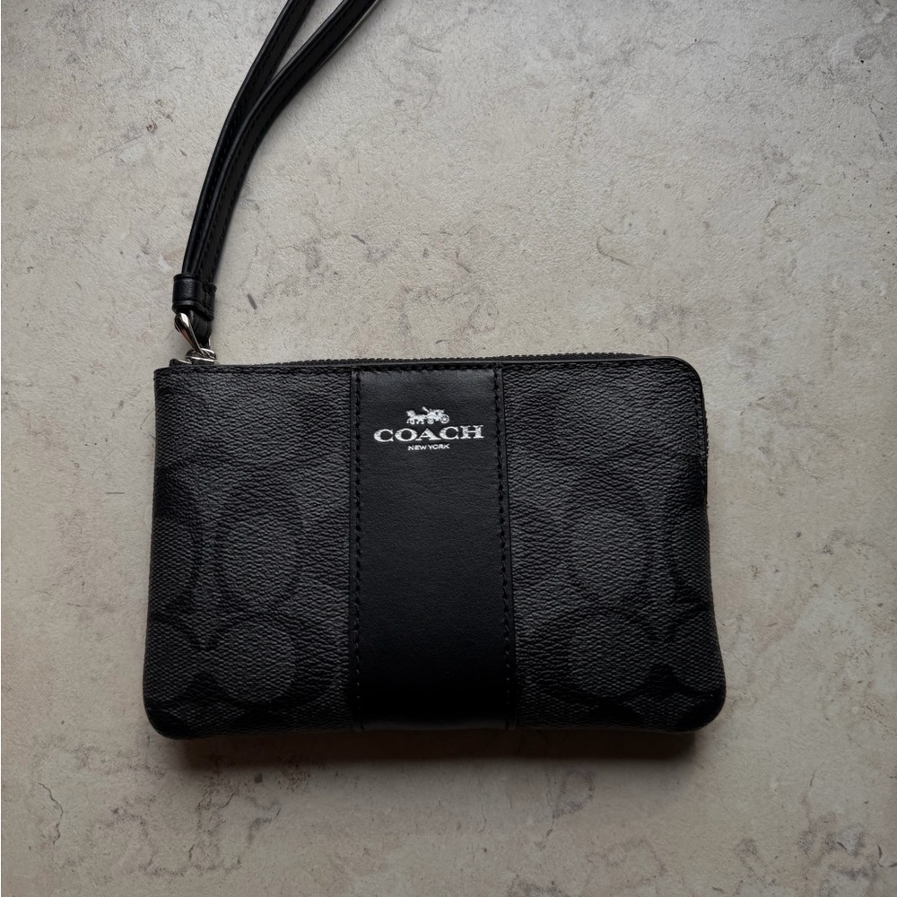 Coach Black Leather Wristlet 
Taking offers